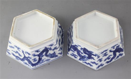 A pair of Chinese blue and white dragon hexagonal bowls, early 20th century, 18.5cm wide